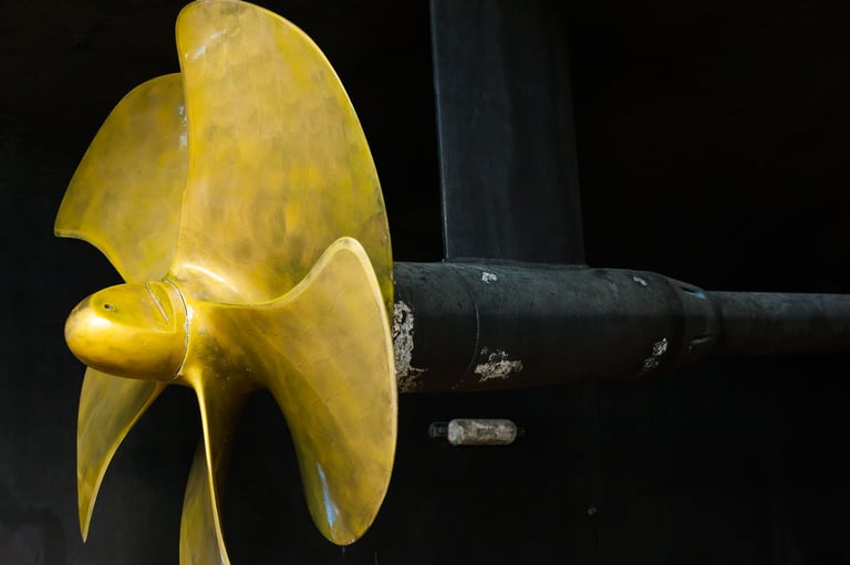 A new bronze five-bladed propeller is installed on the ship, close-up.