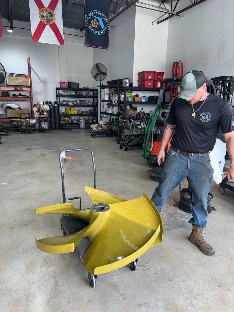 Firefighter in garage examining yellow equipment with shelves of tools and supplies visible in background